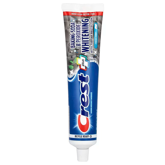 Dentifrice Crest Plus au fluor, enrichi en bicarbonate de soude et peroxyde pour un blanchiment efficace, protection contre les caries et haleine fraîche à la menthe.